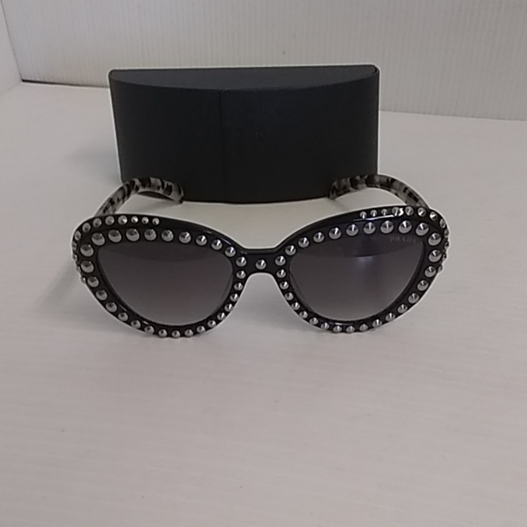 Prada Accessories - Prada woman sunglasses SPR 31QS cat eye